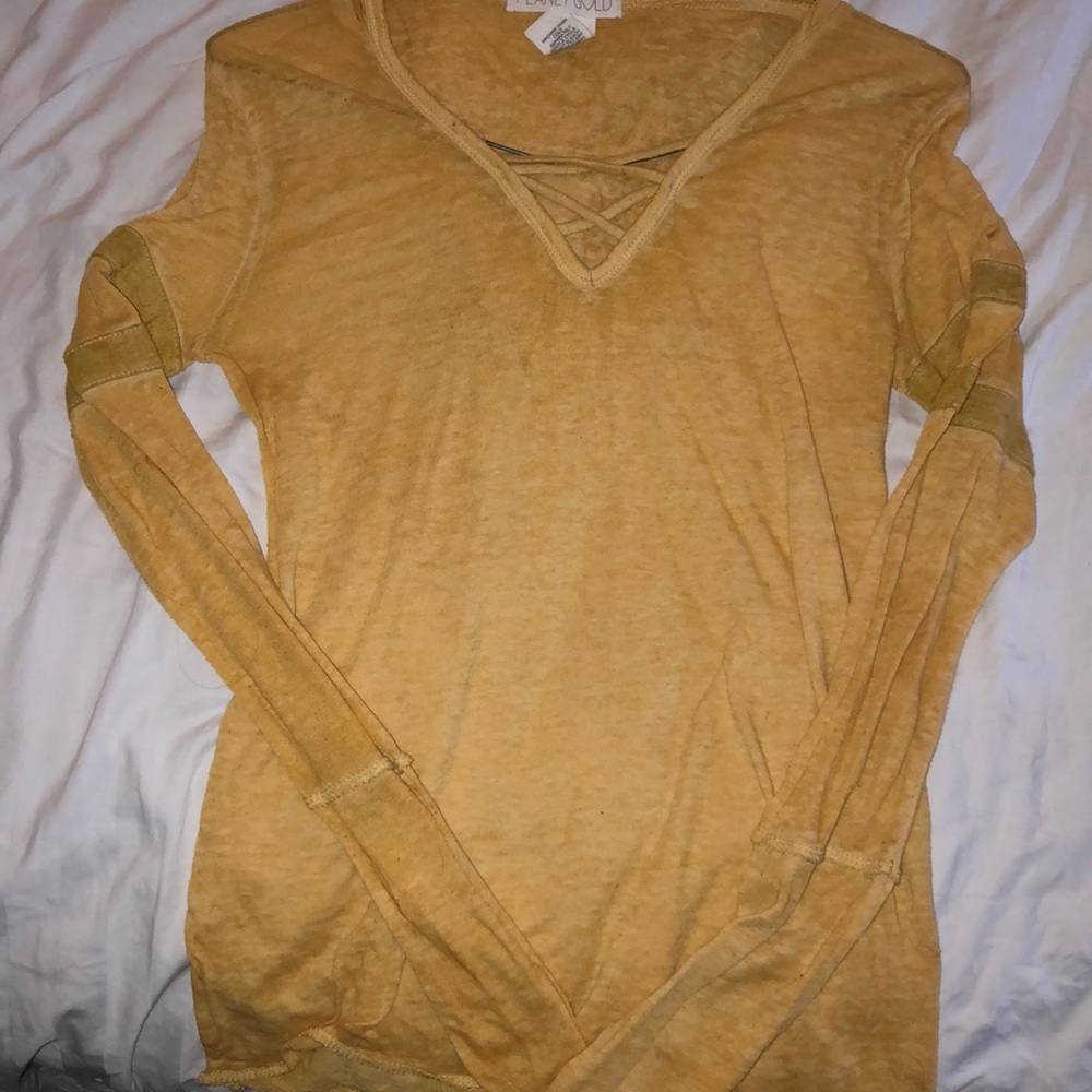 yellow long sleeve shirt